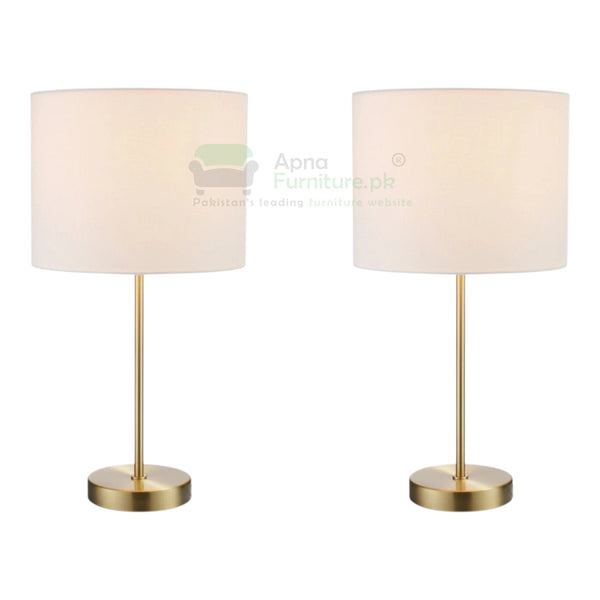 Two table lamps with beige shades and gold bases on a white background, branded 'Apna Furniture'.