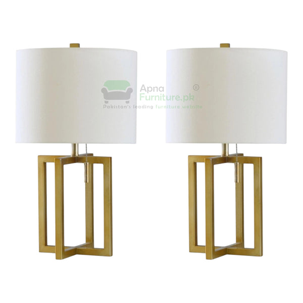 Two table lamps with gold frames and white lampshades on a white background, branded 'Apna Furniture'.