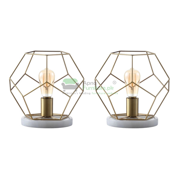 Two geometric table lamps with marble bases on a white background,