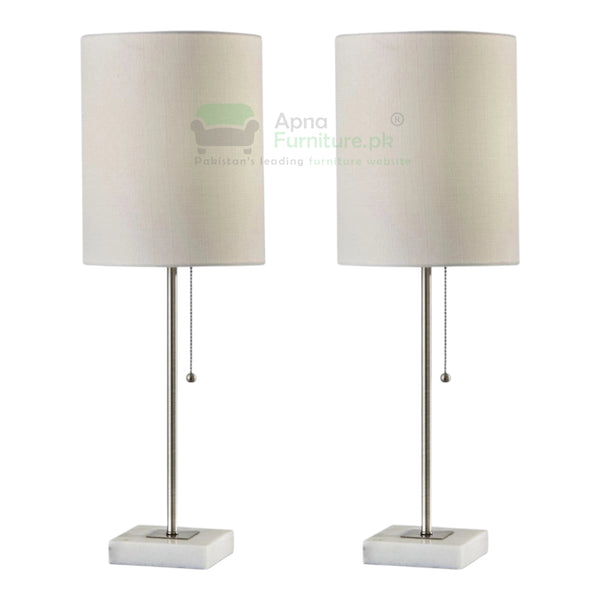 Two table lamps with white lampshades and metal bases on a white background.