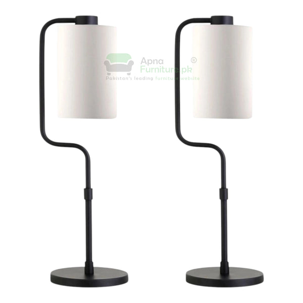 Two black table lamps with white lampshades on a white background