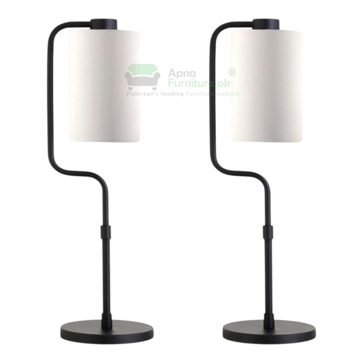 Two black table lamps with white lampshades on a white background