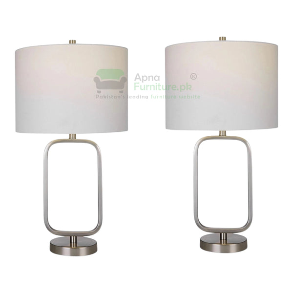 Two table lamps with white shades and metallic bases on a white background.