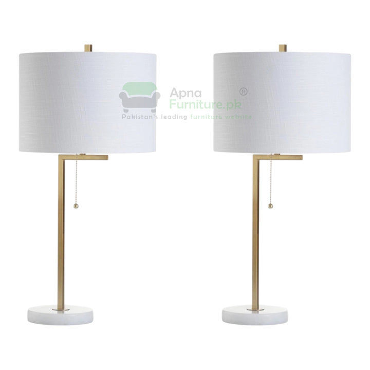 Two table lamps with white lampshades and gold bases on a white background, branded 'Apna Furniture'.