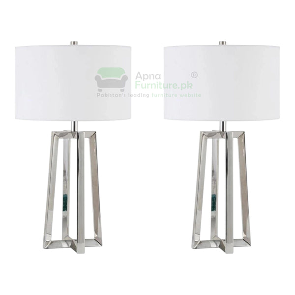 Two table lamps with white lampshades and metallic bases on a white background.