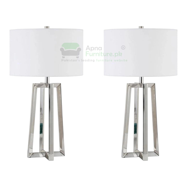 Two table lamps with white lampshades and metallic bases on a white background.