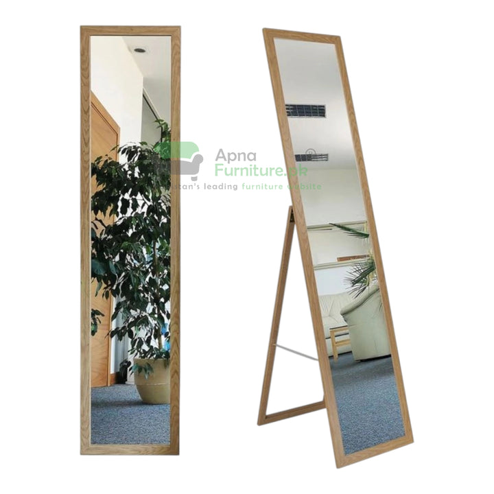 Wooden standing mirror with a plant reflection