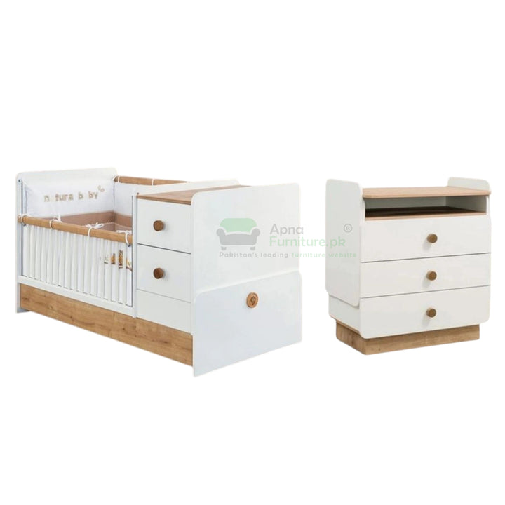 White and wooden crib with drawers 