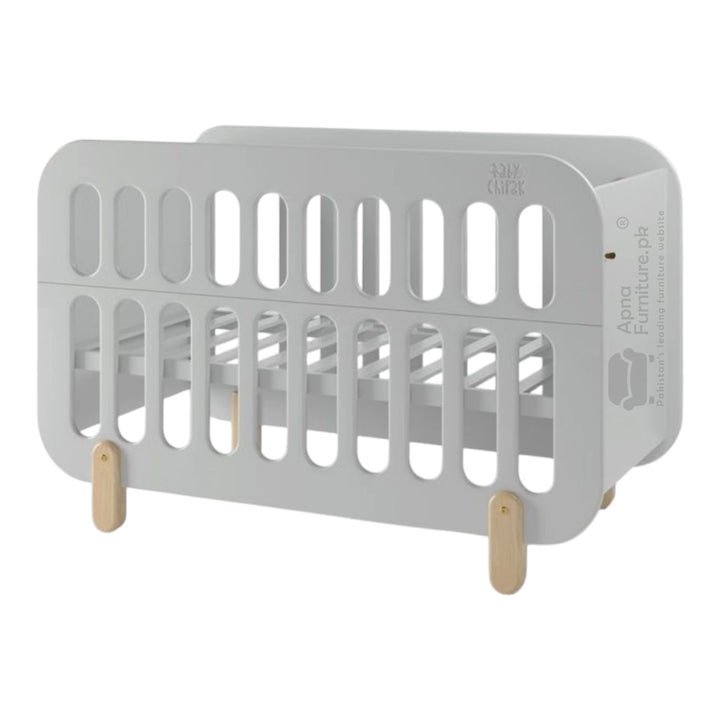 Gray crib with wooden legs on a white background