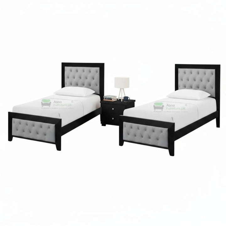 Two twin beds with tufted headboards and matching nightstands.
