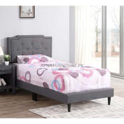 single bed with grey upholstery
