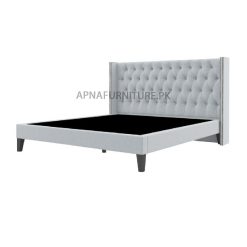 elegant double bed with velvet upholstery and wooden legs