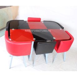 dining table for six persons in glass top and foam padded chairs